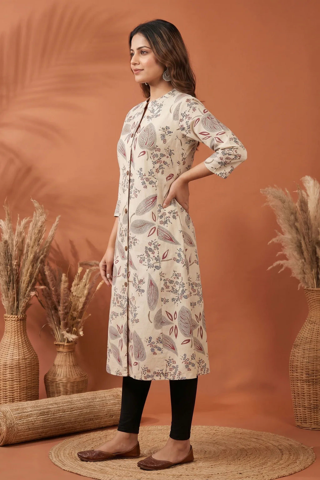 Cream Cotton A Line Princess Cut Kurta with Leaf Print
