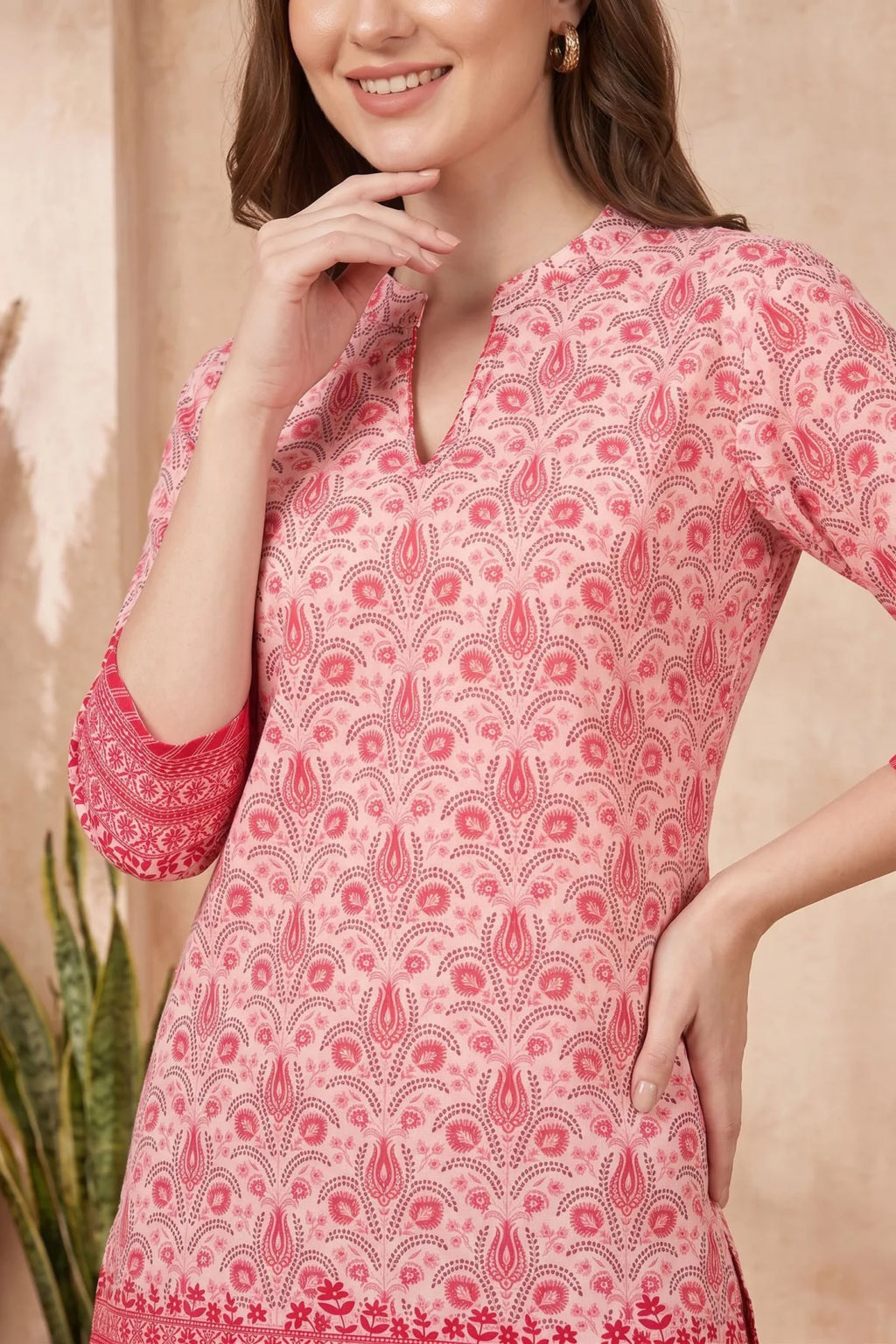 Pinky Peach Paisley Printed Short Kurti with Red Floral Border