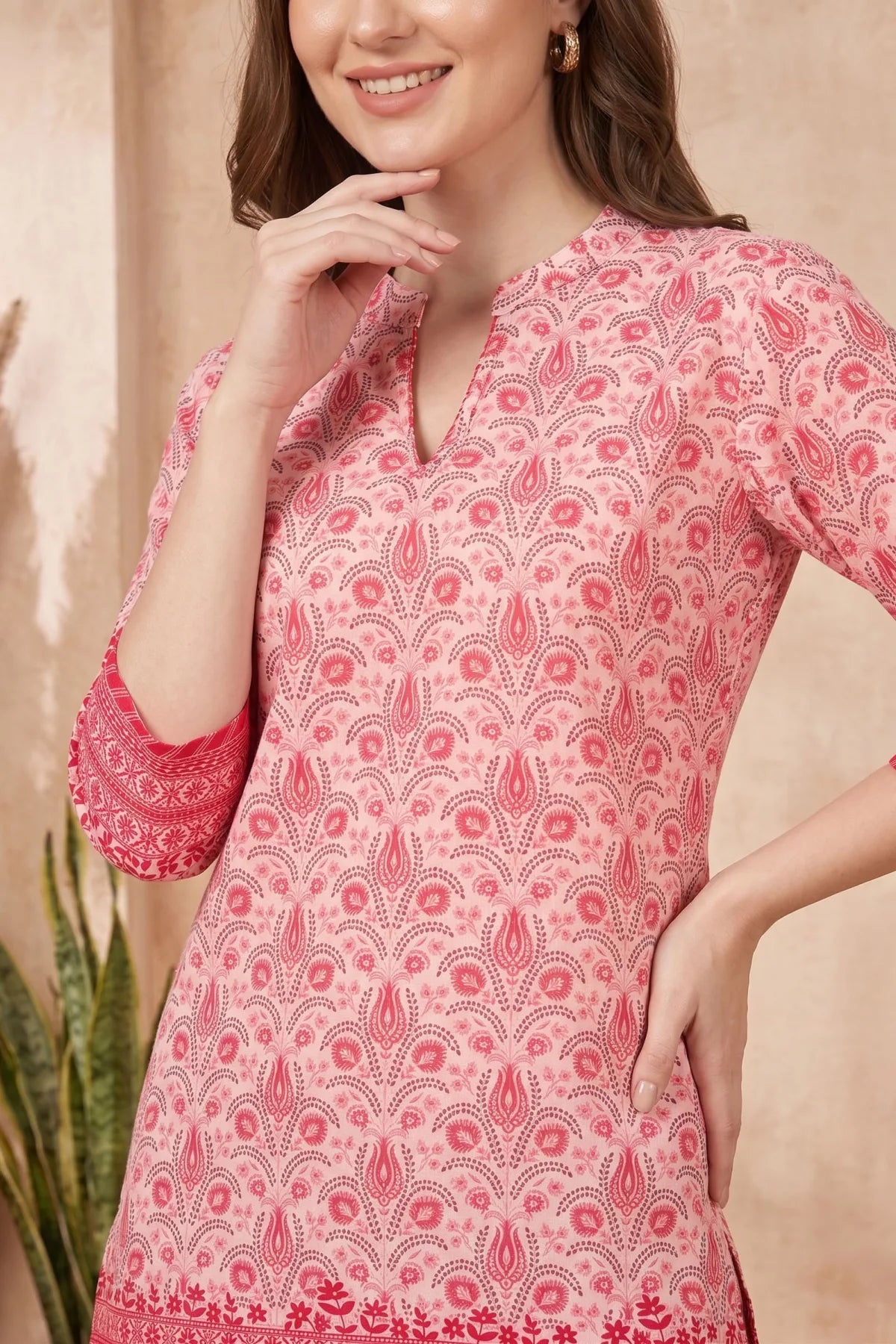 Pinky Peach Paisley Printed Short Kurti with Red Floral Border